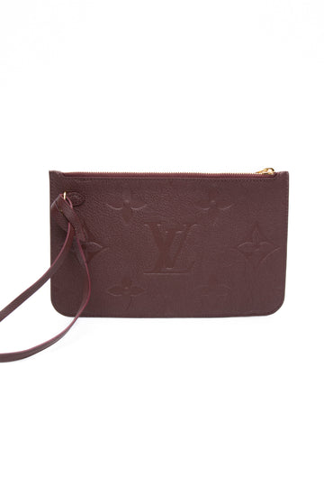 LOUIS VUITTON Wine Monogram Empreinte Leather Wristlet (New)