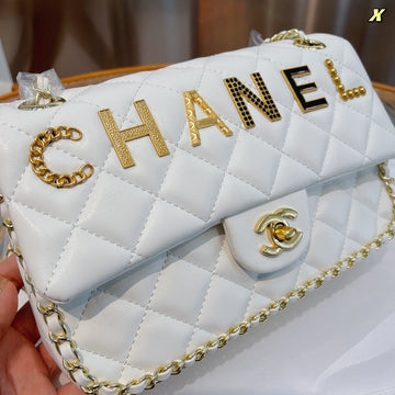 Designer bags by Chanel 295
