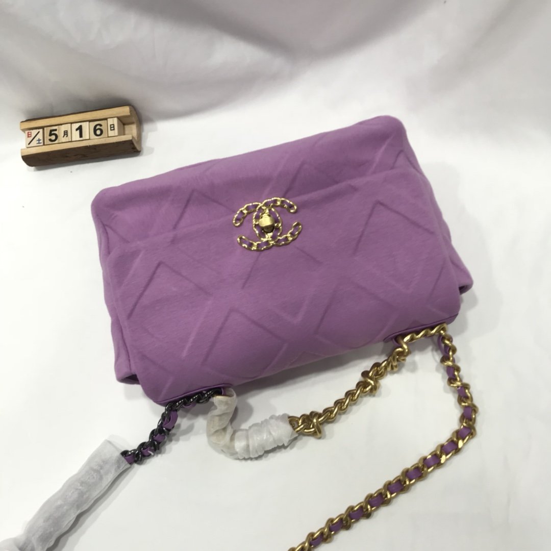 Designer bags by Chanel 196