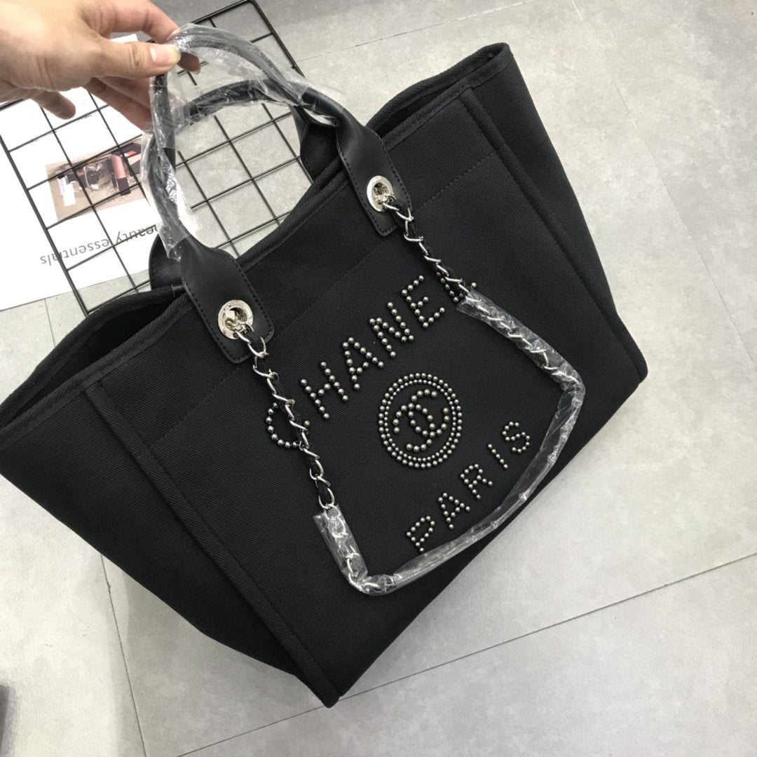 Designer bags by Chanel 189