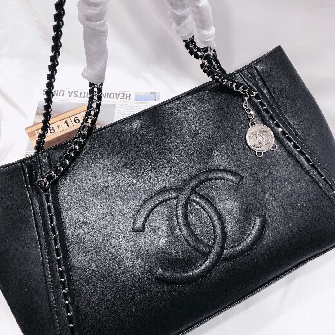 Designer bags by Chanel 210