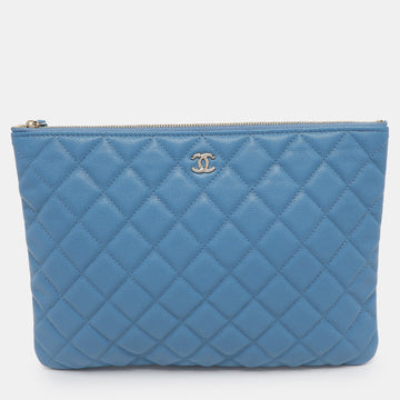 Blue Quilted Caviar Leather O Case Clutch