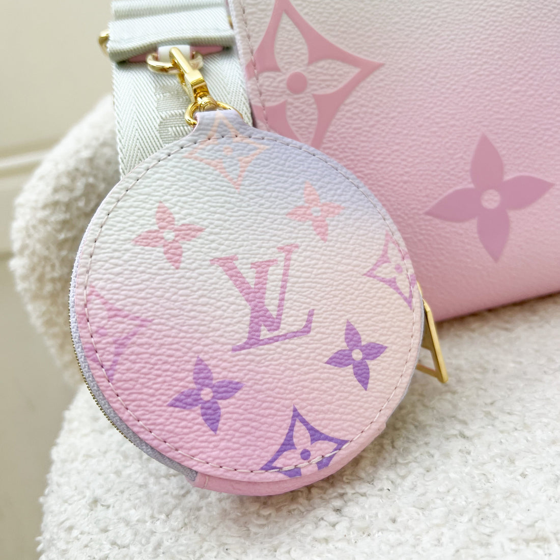 LV Onthego PM in Pastel Sunrise Monogram Empreinte Leather GHW