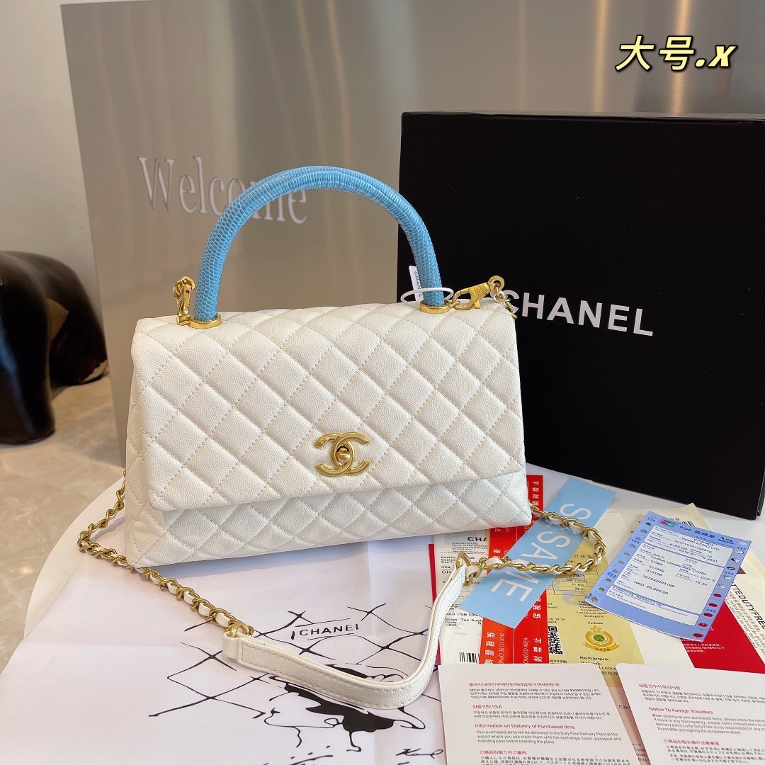 Designer bags by Chanel 266