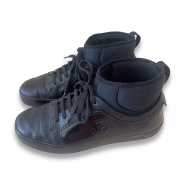 CHANEL BLACK RUBBER AND LEATHER CC SNEAKERS