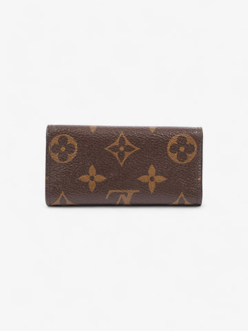 Louis Vuitton 4 Key Holder Monogram / Gold Coated Canvas