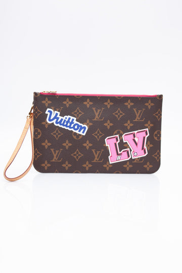 LOUIS VUITTON Monogram World Tour Wristlet