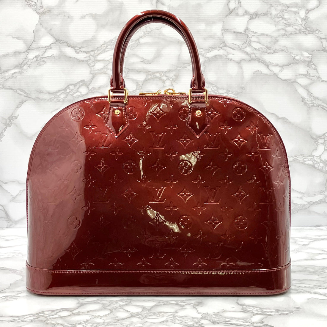 LOUIS VUITTON Vernis Alma MM
