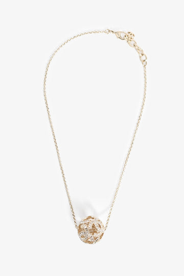 Chanel™ Gold Tone Baguette Crystal CC Ball Pendant Necklace