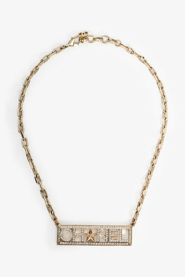 Chanel™ 2017 Gold Toned Crystal Embellished Logo Star Choker Necklace