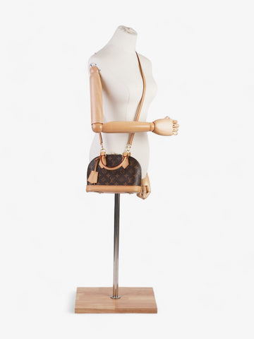 Louis Vuitton Alma BB Monogram Coated Canvas