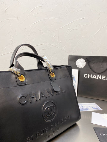 Designer bags by Chanel 255