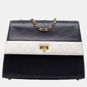 Black/White CC Lambskin Trapezoid Flap Bag
