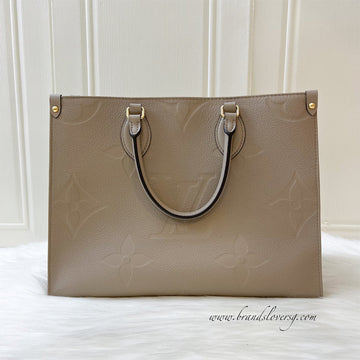 LV Onthego MM in Tourterelle Empreinte Leather and GHW
