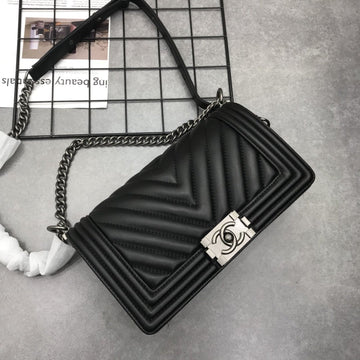 Designer bags by Chanel 177
