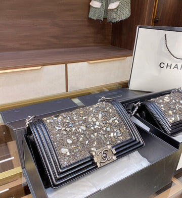Designer bags by Chanel 153
